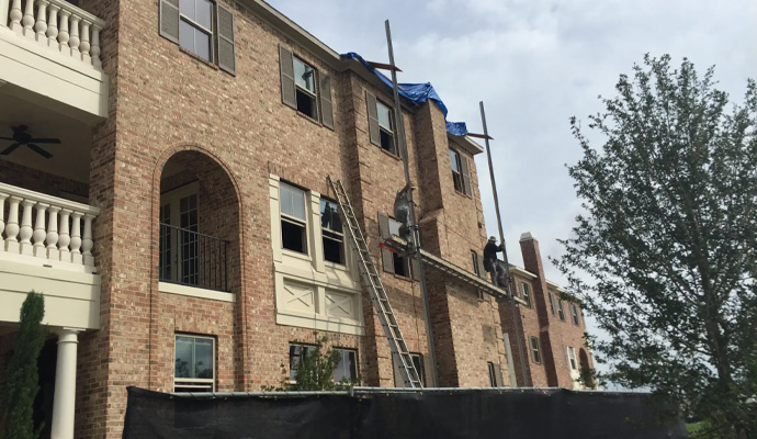 Disaster damaged multifamily house restoration service