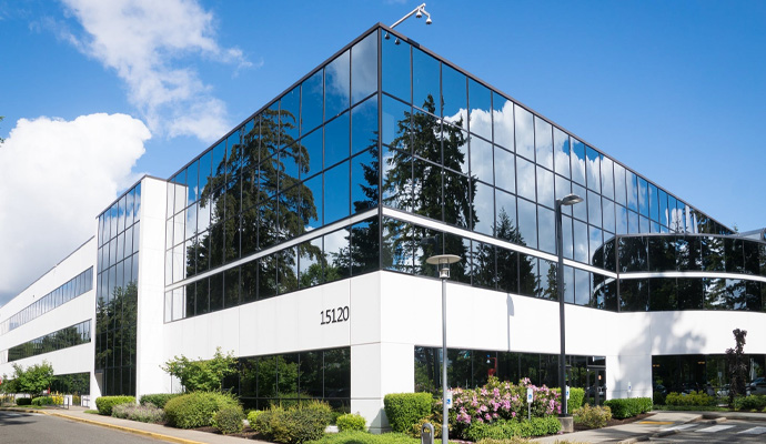 Modern commercial office building with reflective glass